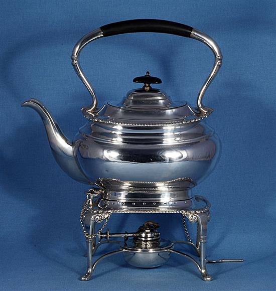 A silver kettle on stand, Height 12 ½”/318mm Width 10”/254mm., Weight 50oz/1418grms.